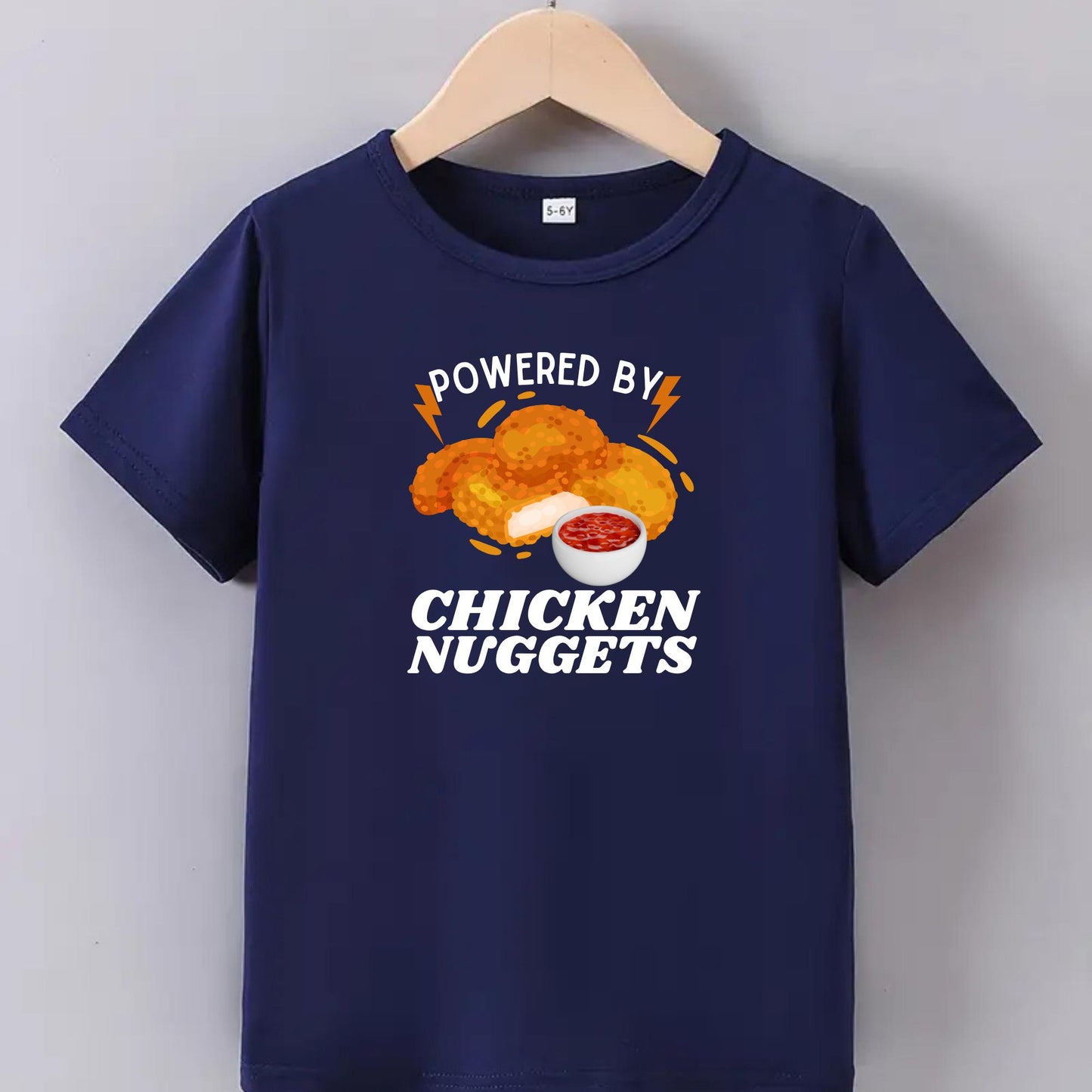 Powered by Chicken Nuggets T-Shirt – Funny Food Graphic Tee for Kids – Fast Food Lover Shirt – Snack Joke Toddler Tee