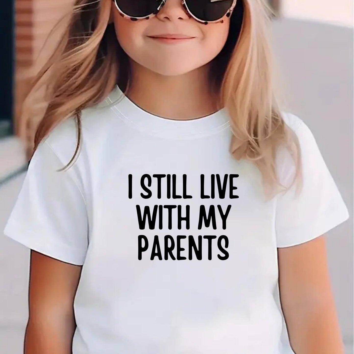 I Still Live with My Parents Kids T-Shirt – Funny Toddler Graphic Tee – Humorous Shirt – Cute Baby Shower or Birthday Gift